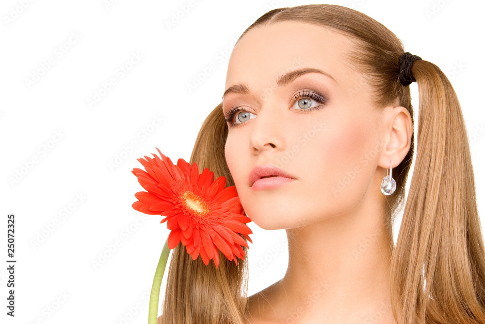 woman in towel with red flower woman in towel with red flower