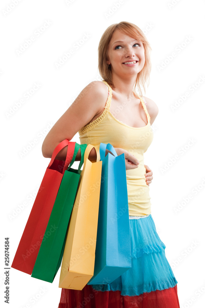 Smiling girl with colorful bags Smiling girl with colorful bags
