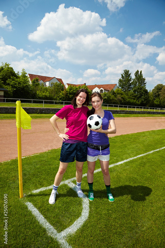 Fußballfrauen an der Ecke