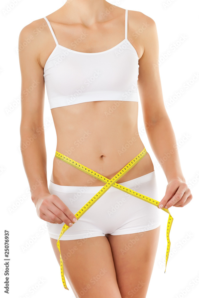 Woman measuring her slim body isolated on white