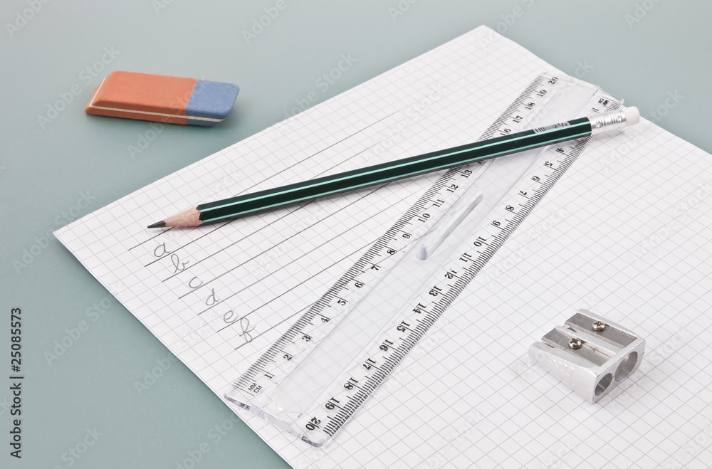 Write training supplies on a white paper Write training supplies on a white paper
