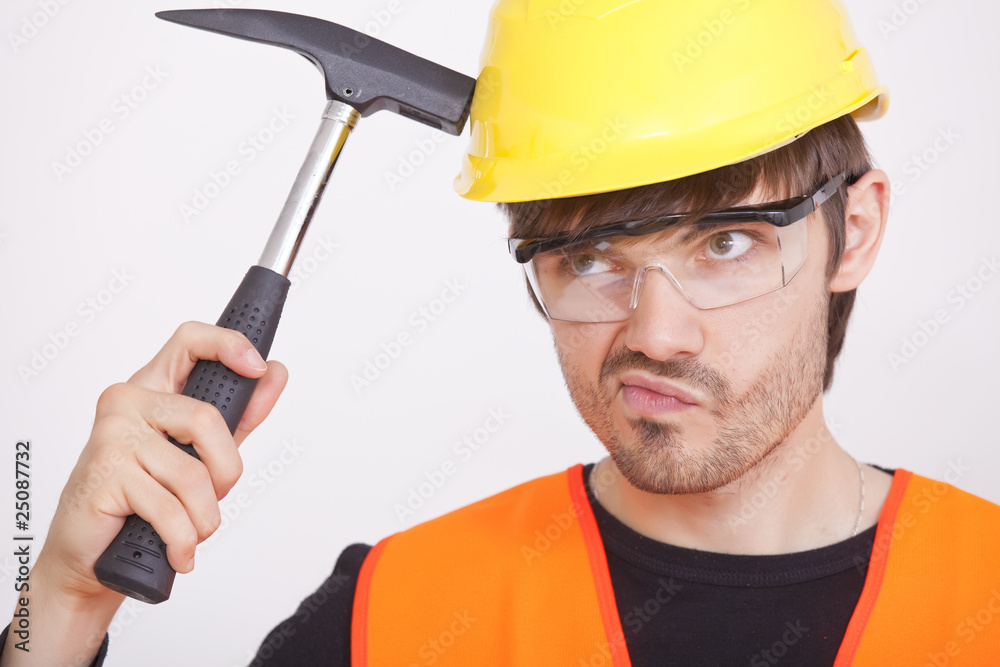 thinking carpenter with hammer thinking carpenter with hammer