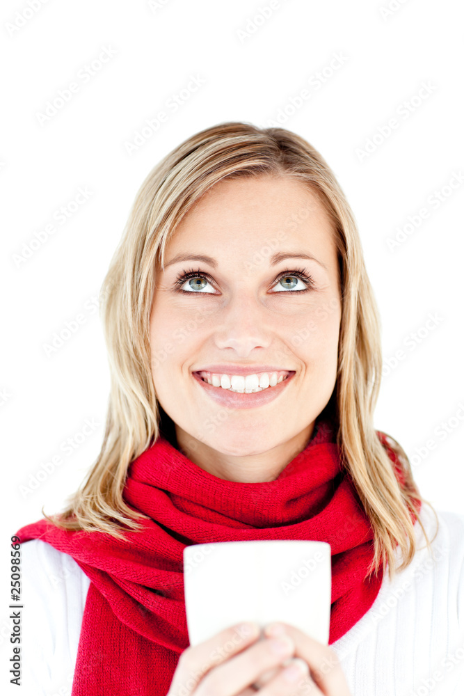 Blissful young woman holding a cup wearing a scarf Blissful young woman holding a cup wearing a scarf