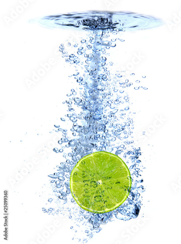 Fresh lime dropped into the water