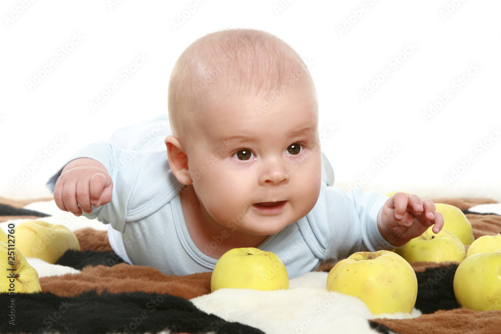 Beautiful child in apples