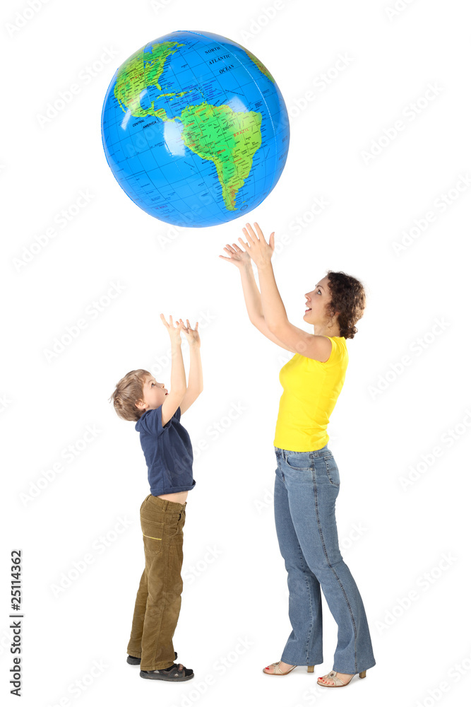 mother and son throw up inflatable globe, side view, isolated mother and son throw up inflatable globe, side view, isolated