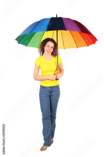 young beauty woman in yellow shirt with multicolored umbrella