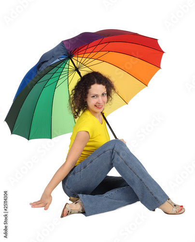 attractive woman in yellow shirt with multicolored umbrella