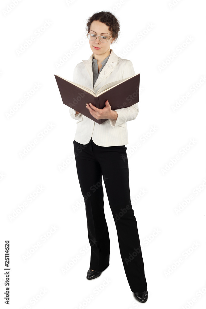 young attractive woman in business dress standing and reading young attractive woman in business dress standing and reading