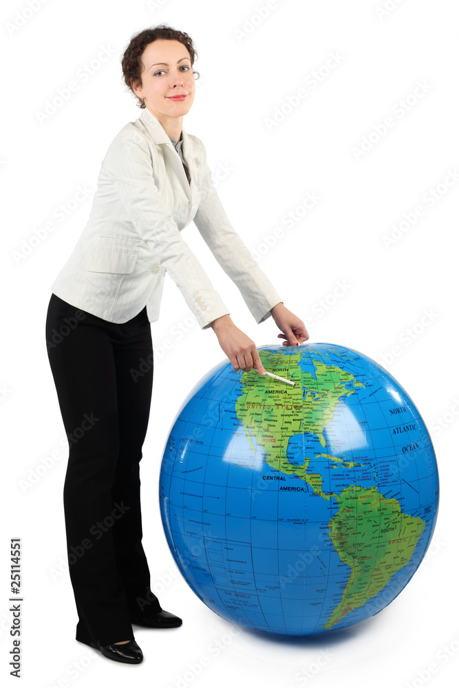 woman in white jacket standing and pointing at North America woman in white jacket standing and pointing at North America