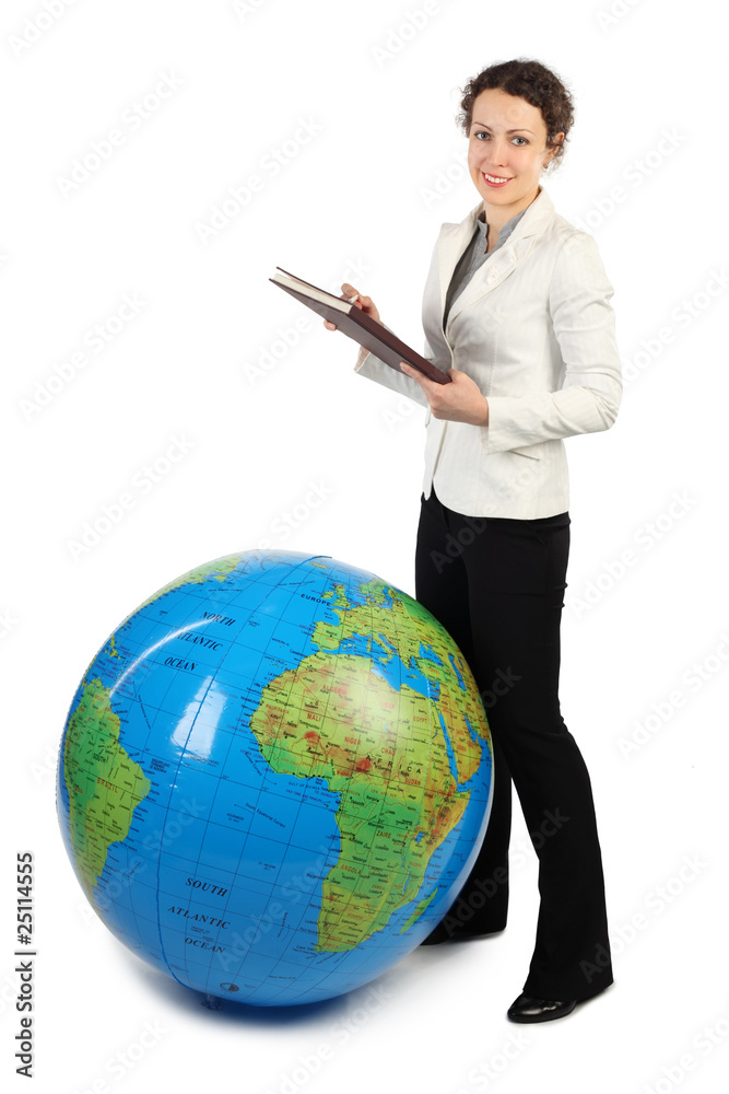young beauty woman standing near big inflatable globe young beauty woman standing near big inflatable globe