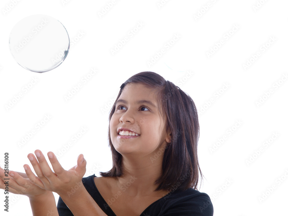 smiling girl catching soap bubbles isolated on white background smiling girl catching soap bubbles isolated on white background