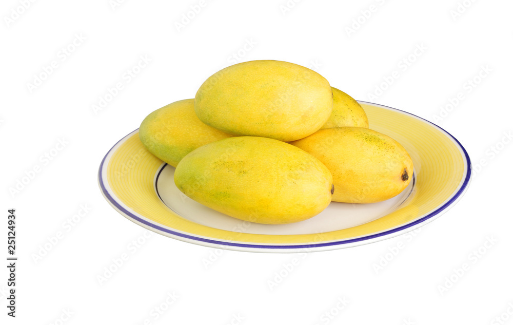 Fresh mangoes kept on the plate