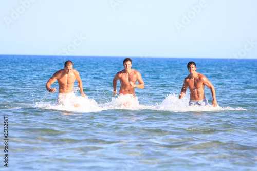 Men Relaxing On the Beach