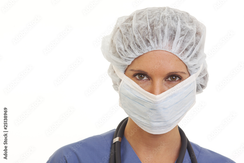 Close up portrait of woman doctor with surgical mask and cap Close up portrait of woman doctor with surgical mask and cap