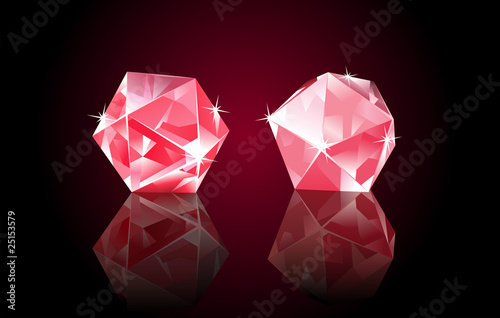 Two red rubin diamonds, lying on black mirrored background photo