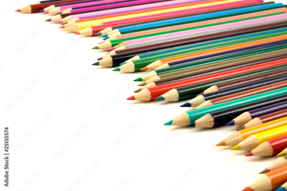 row of colored pencils on white background row of colored pencils on white background