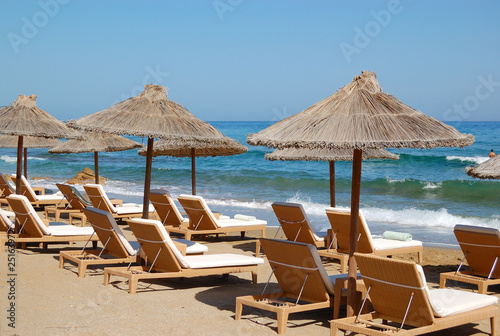Sunbeds at the beach of luxury hotel  Crete  Greece
