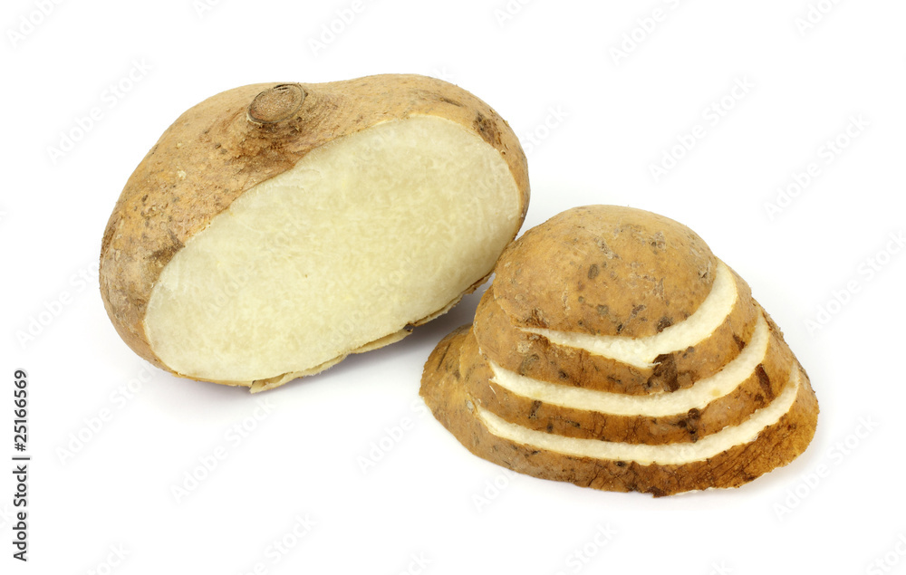 Jicama root that has been cut and sliced Jicama root that has been cut and sliced