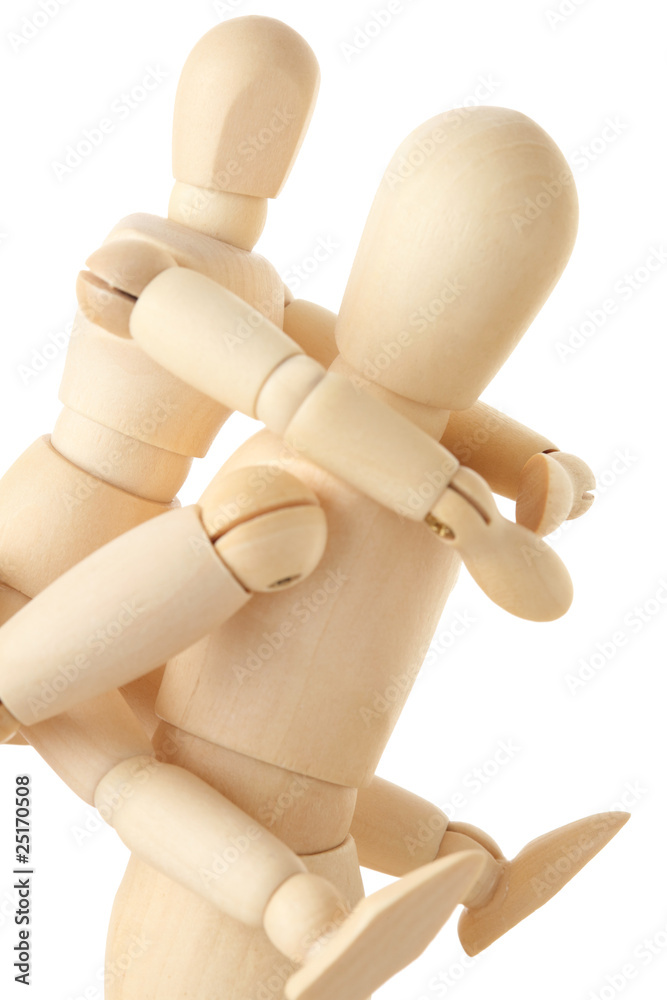 wooden figures of child sitting on back of his parent, half body