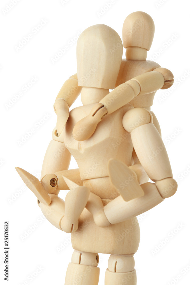 wooden figures of child sitting on back of his parent wooden figures of child sitting on back of his parent