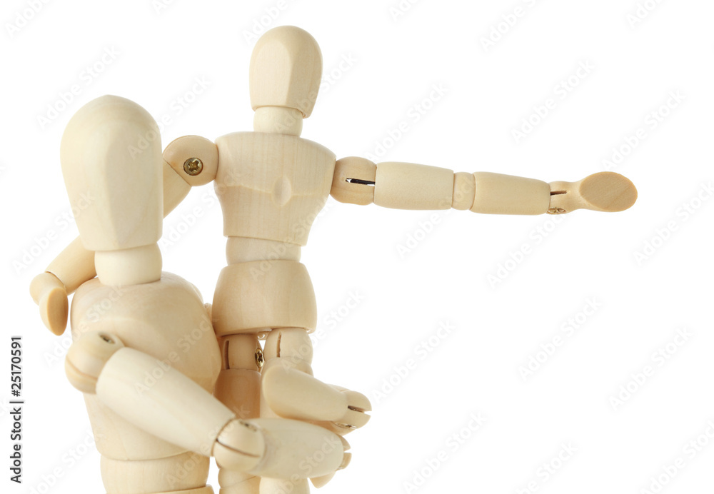 wooden figures of child sitting on hands of his parent wooden figures of child sitting on hands of his parent