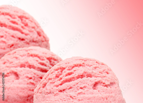 Strawberry ice cream scoops isolated on pink background