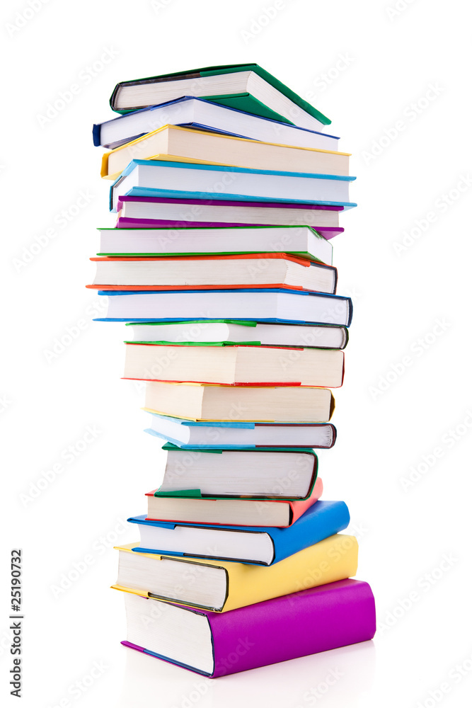 Pile of books on white background