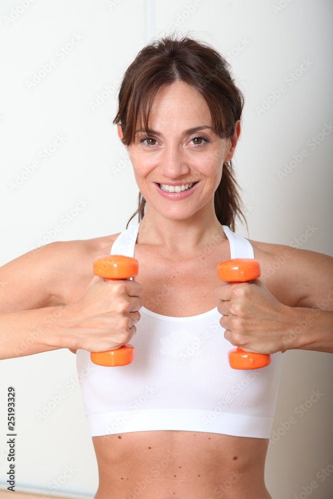 Closeup of woman doing fitness excercises Closeup of woman doing fitness excercises