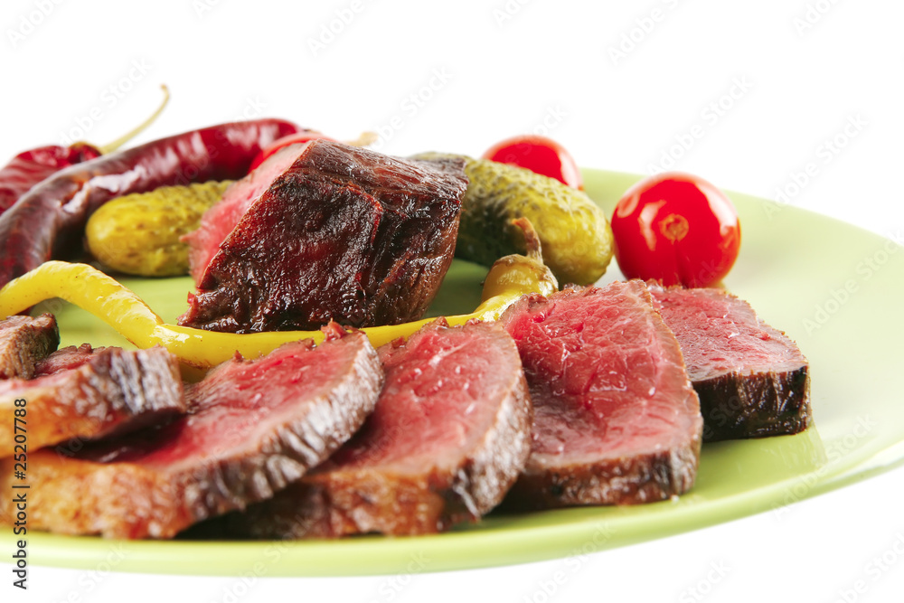 meat and vegetables with peppers