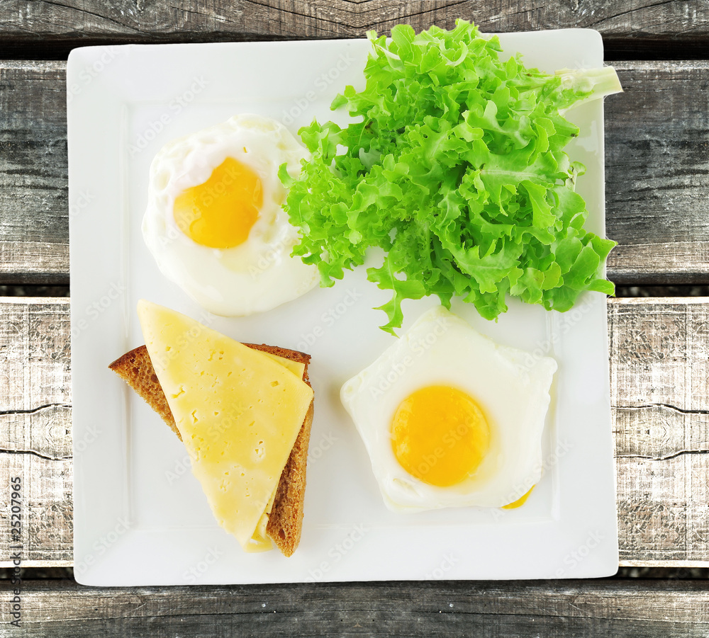 fried eggs and gold cheese with salad fried eggs and gold cheese with salad