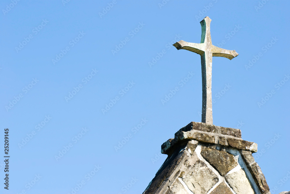 Cross on the top of old church