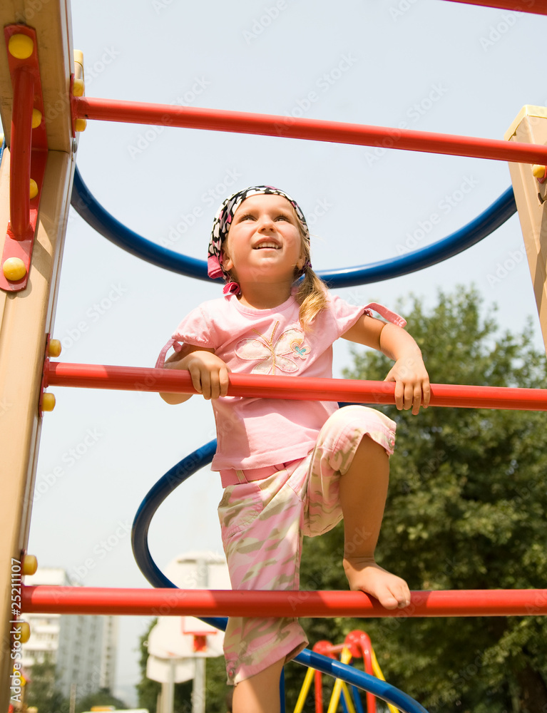 Fototapeta premium Cute girl on playground