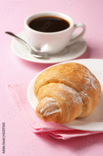 Croissant and black coffee