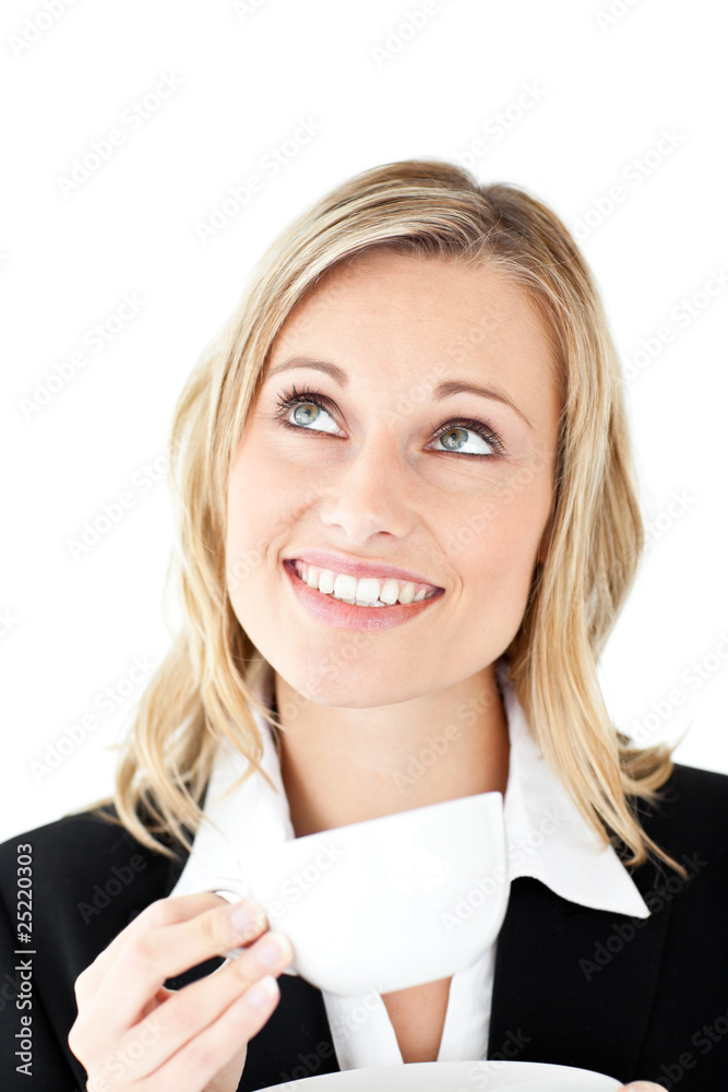 Thoughtful businesswoman holding a cup of coffee Thoughtful businesswoman holding a cup of coffee
