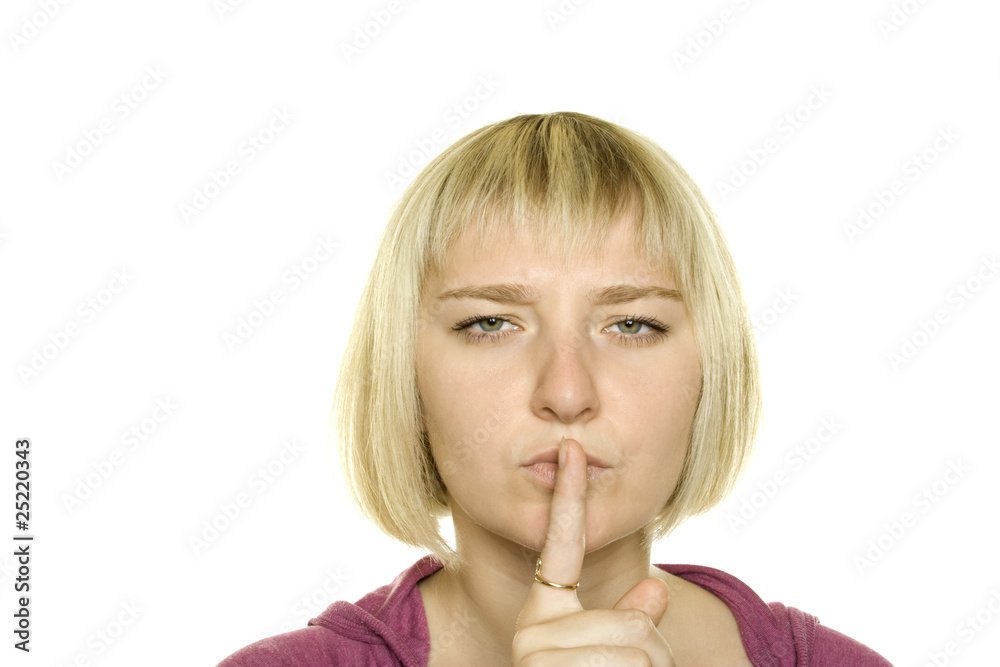 Young Woman Gesturing for Quiet or Shushing Young Woman Gesturing for Quiet or Shushing