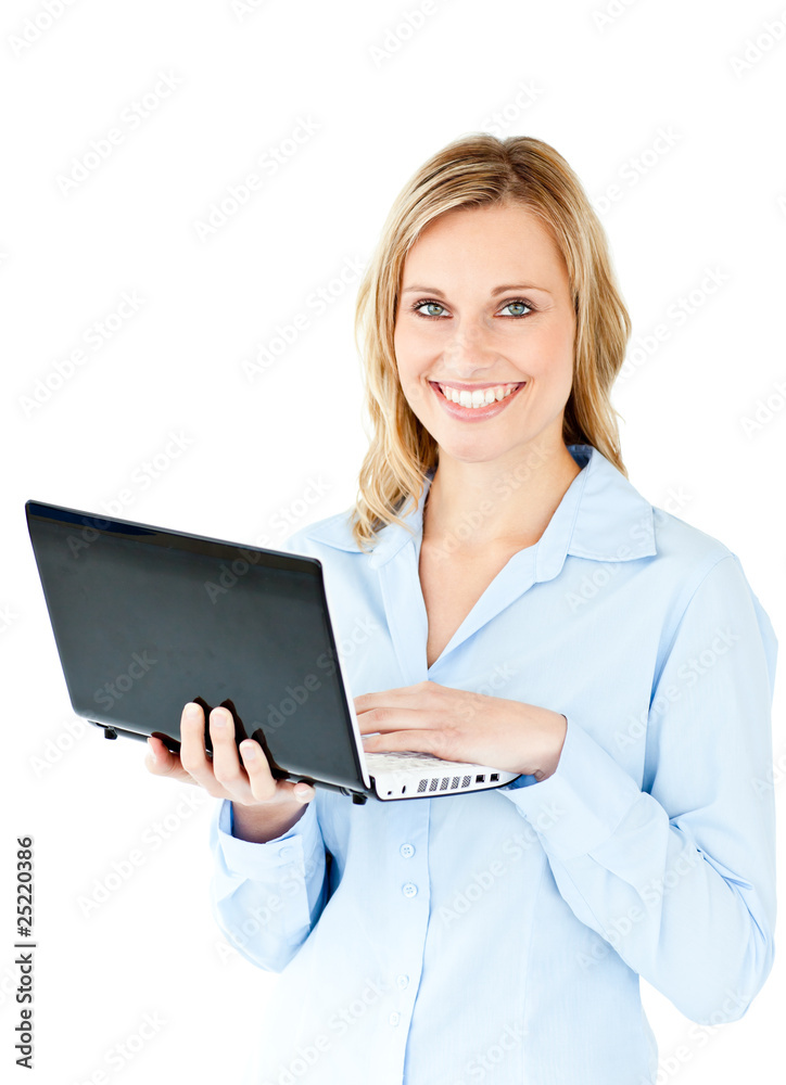 Jolly young businesswoman holding a laptop Jolly young businesswoman holding a laptop