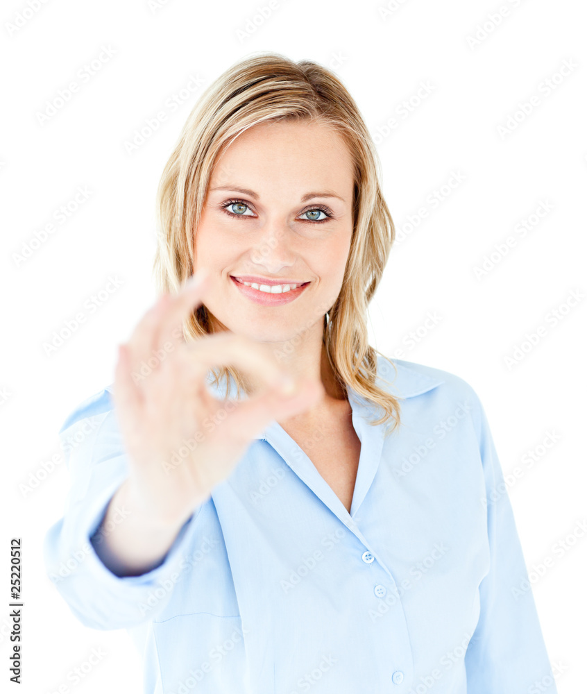 Confident young businesswoman showing OK sign Confident young businesswoman showing OK sign