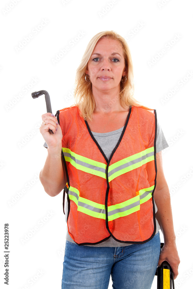 Woman in safety vest over white background Woman in safety vest over white background