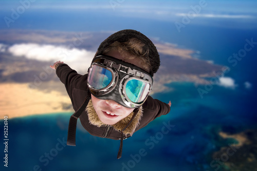 Boy flying, daydreaming he´s a pilot