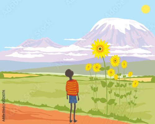 african boy with sunflower
