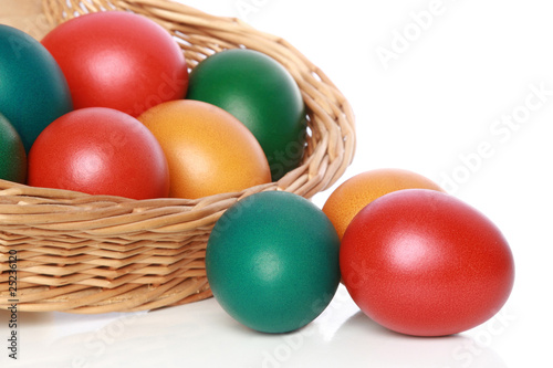 Colour Easter eggs in a wattled basket