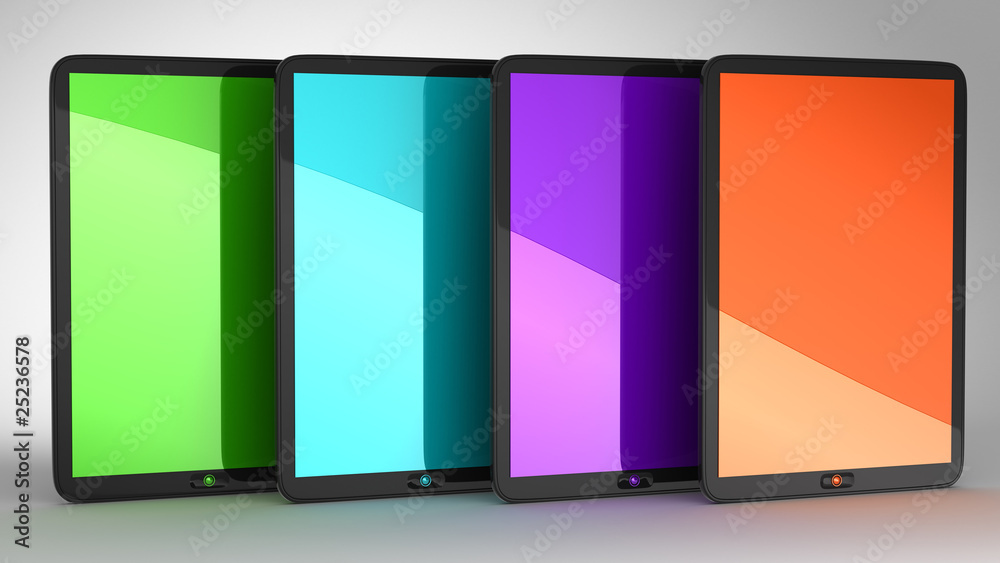Group of four Tablets PCs with colored displays Group of four Tablets PCs with colored displays