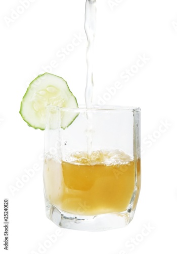 Brine with cucumber in glass isolated with path