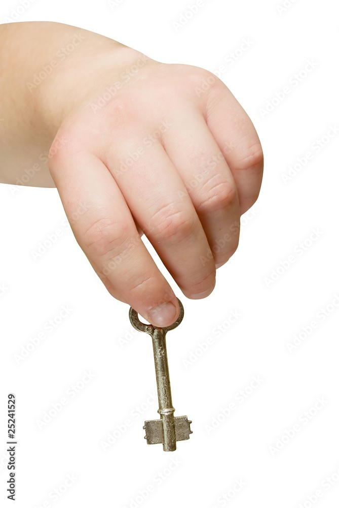 metal key in the hand isolated with path. metal key in the hand isolated with path.
