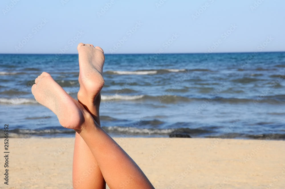 lovely legs on the beach on sky
