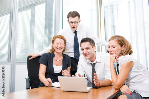 Manager with office workers on meeting