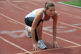Woman at Starting Line on Track