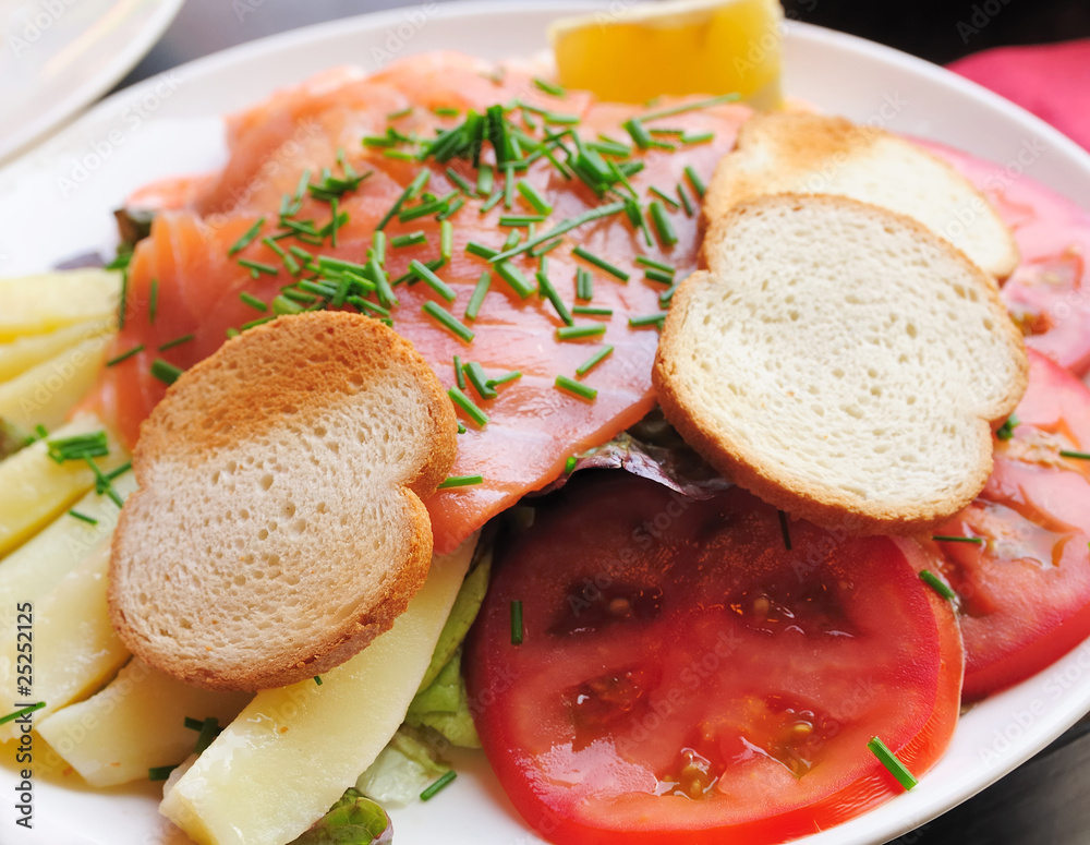 Fresh Salmon with lemon and bread Fresh Salmon with lemon and bread