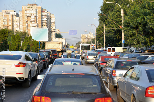 view of a traffic jam at rush hour in european town